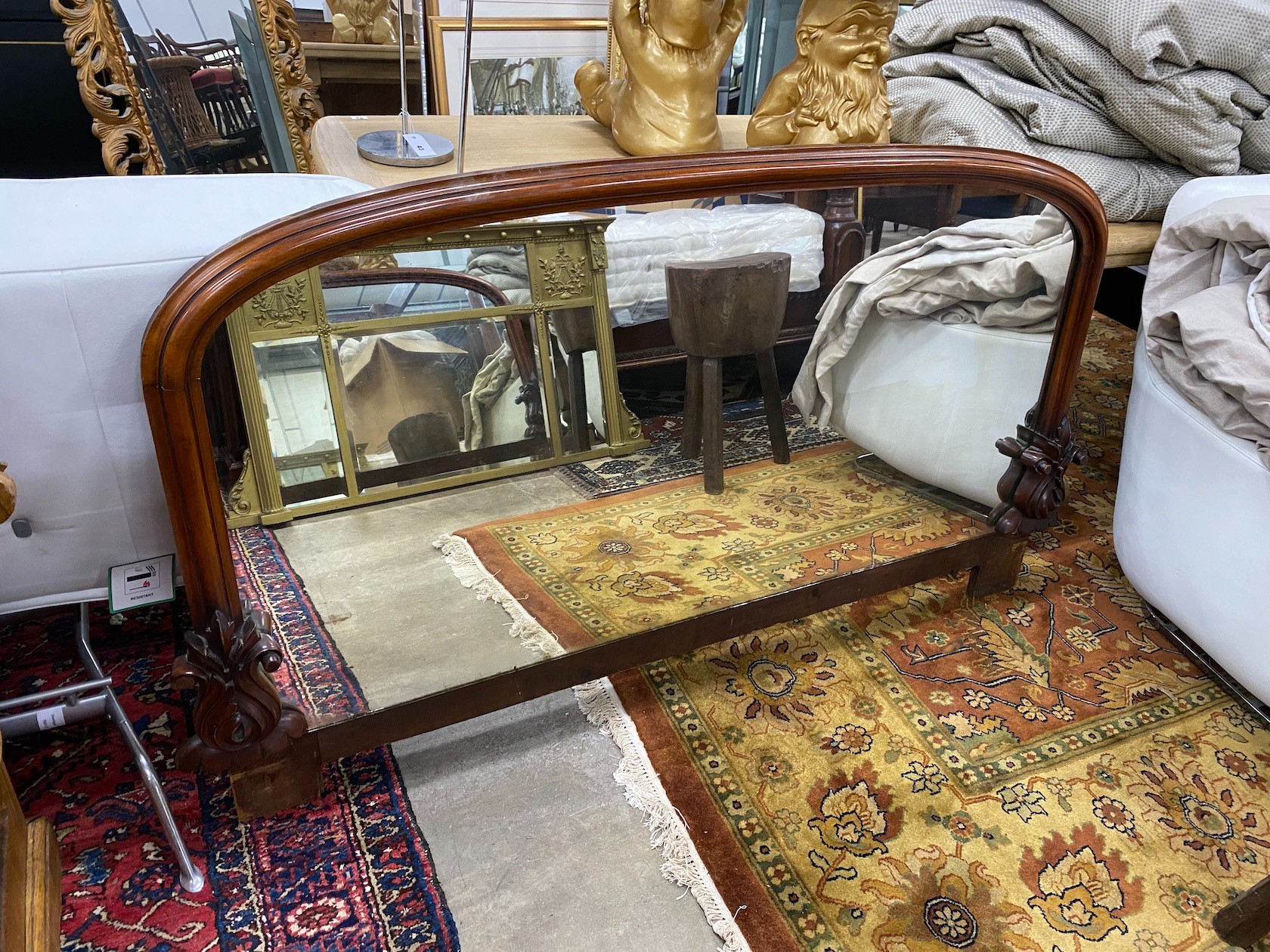 A 19th century Flemish carved oak inverse breakfront pedestal sideboard, length 183cm, depth 60cm, height 92cm, together with a Victorian mahogany mirrored sideboard back